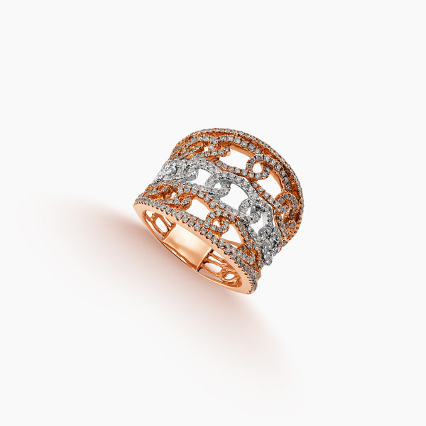 7.25 - TWO-TONE WIDE FILIGREE DIAMOND RING IN 18K ROSE AND WHITE GOLD