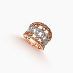 7.25 - TWO-TONE WIDE FILIGREE DIAMOND RING IN 18K ROSE AND WHITE GOLD
