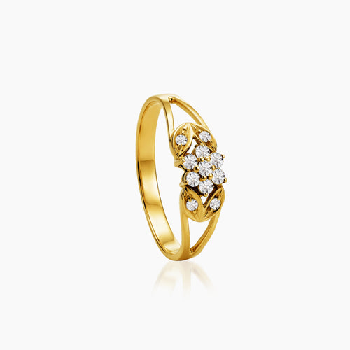 6.75 - FLORAL CLUSTER DIAMOND RING WITH 7=0.125/ 4=0.035/1 CARAT DIAMOND IN 14K YELLOW GOLD