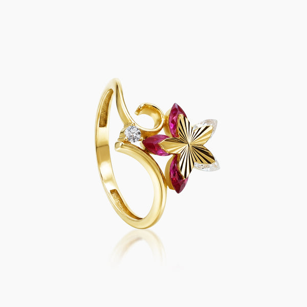 7 - FLORAL LADIES RING WITH WHITE AND RED GEMS IN (SAUDI) 18K YELLOW GOLD