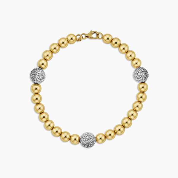 BEADED BRACELET WITH PAVE CUBIC ZIRCONIAN SPHERES IN (SAUDI) 18K YELLOW GOLD