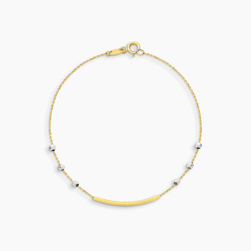 TWO-TONE BAR AND BEAD STATION CHAIN BRACELET IN (SAUDI) 18K YELLOW AND WHITE GOLD