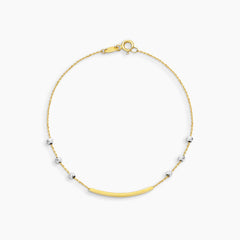 TWO-TONE BAR AND BEAD STATION CHAIN BRACELET IN (SAUDI) 18K YELLOW AND WHITE GOLD