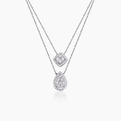 DIAMOND NECKLACE WITH PILLOW AND PEAR PENDANTS FEATURING 12=0.47 /56=0.34/6.02 CARAT DIAMONDS IN 18K WHITE GOLD