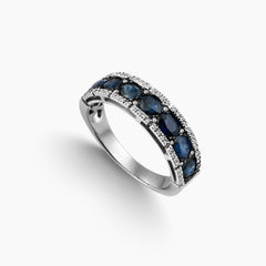 6.75 - SAPPHIRE RING WITH DIAMOND ACCENTS IN 18K WHITE GOLD