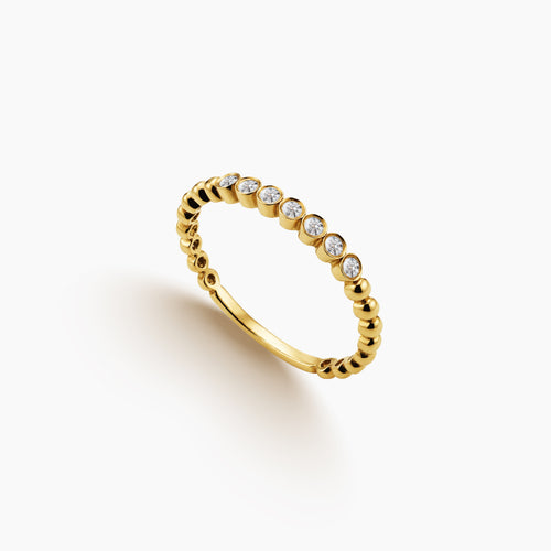 7 - BEZEL-SET HALF BEAD DIAMOND RING IN 18K YELLOW GOLD