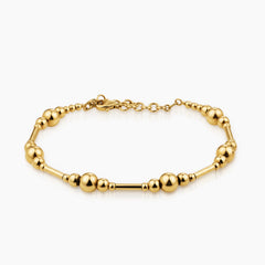 ALTERNATING BEAD AND BAR BANGLE BRACELET IN (SAUDI) 18K YELLOW GOLD