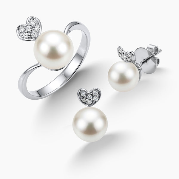 7 - ROUND WHITE FRESH WATER PEARL LADIES RING AND STUD EARRINGS SET WITH HEART-SHAPED CLUSTER DIAMOND ACCENTS IN 14K WHITE GOLD
