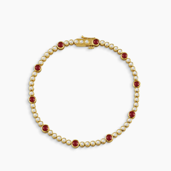 BEZEL-SET ROUND RUBY AND DIAMOND TENNIS BRACELET IN 18K YELLOW GOLD