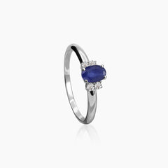 7 - SAPPHIRE LADIES RINGS WITH BLUE SAP=0.60 AND 4=0.08 CARAT WHITE DIAMOND IN 18K WHITE GOLD