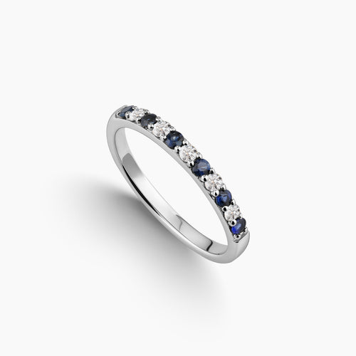 6.75 - SLIM RING IN ALTERNATING COLORED GEMS DESIGN WITH BLUE SAPHIRES AND WHITE DIAMONDS IN 18K WHITE GOLD
