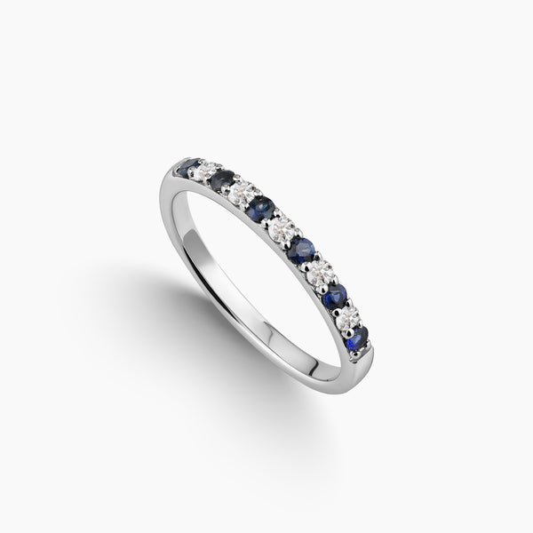 6.75 - SLIM RING IN ALTERNATING COLORED GEMS DESIGN WITH BLUE SAPHIRES AND WHITE DIAMONDS IN 18K WHITE GOLD