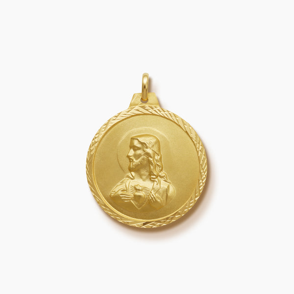 STO. NIÑO MEDAL AND SACRED HEART MEDAL WITH DIAMOND CUT BORDER (27 MM) IN (SPANISH) 18K YELLOW GOLD