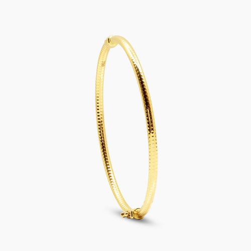 TEXTURED DIAMOND CUT LADIES BANGLE IN (SAUDI) 18K YELLOW GOLD