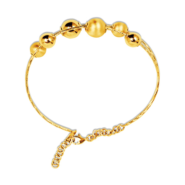 BANGLE WITH BALL IN 18K YELLOW GOLD