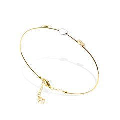 TWO-TONE HALF BANGLE WITH 3 HEARTS IN 18K GOLD